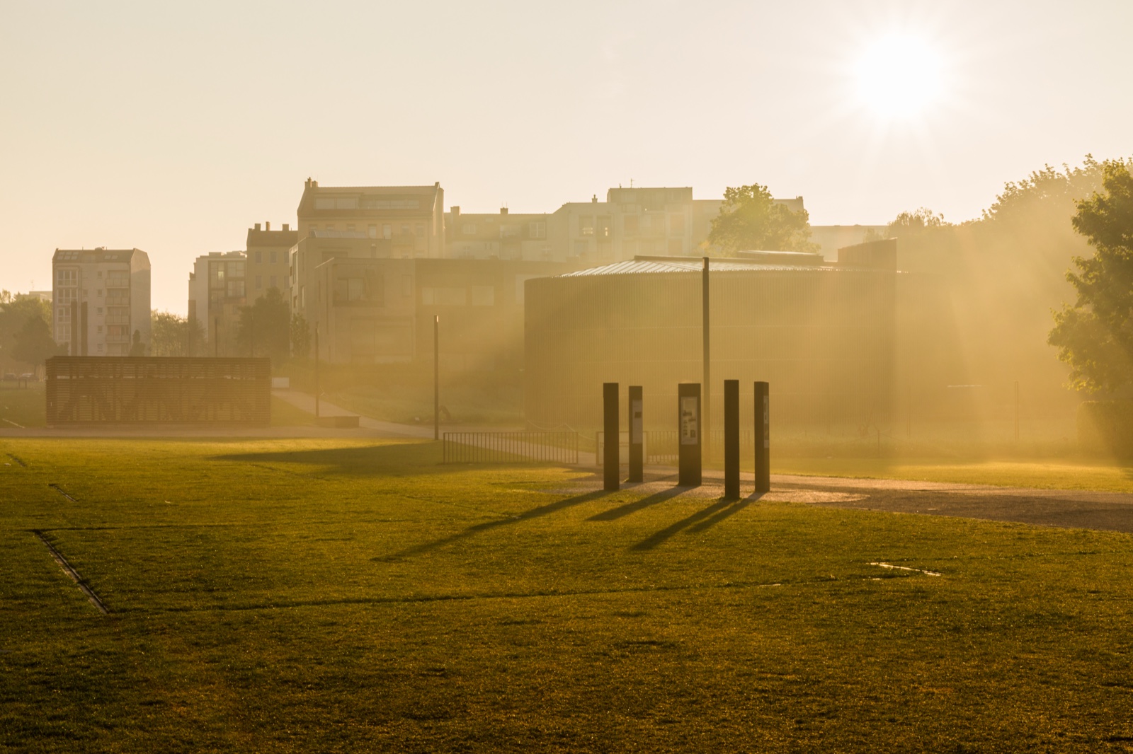 Berlin Wall Memorial grounds in warm morning light
