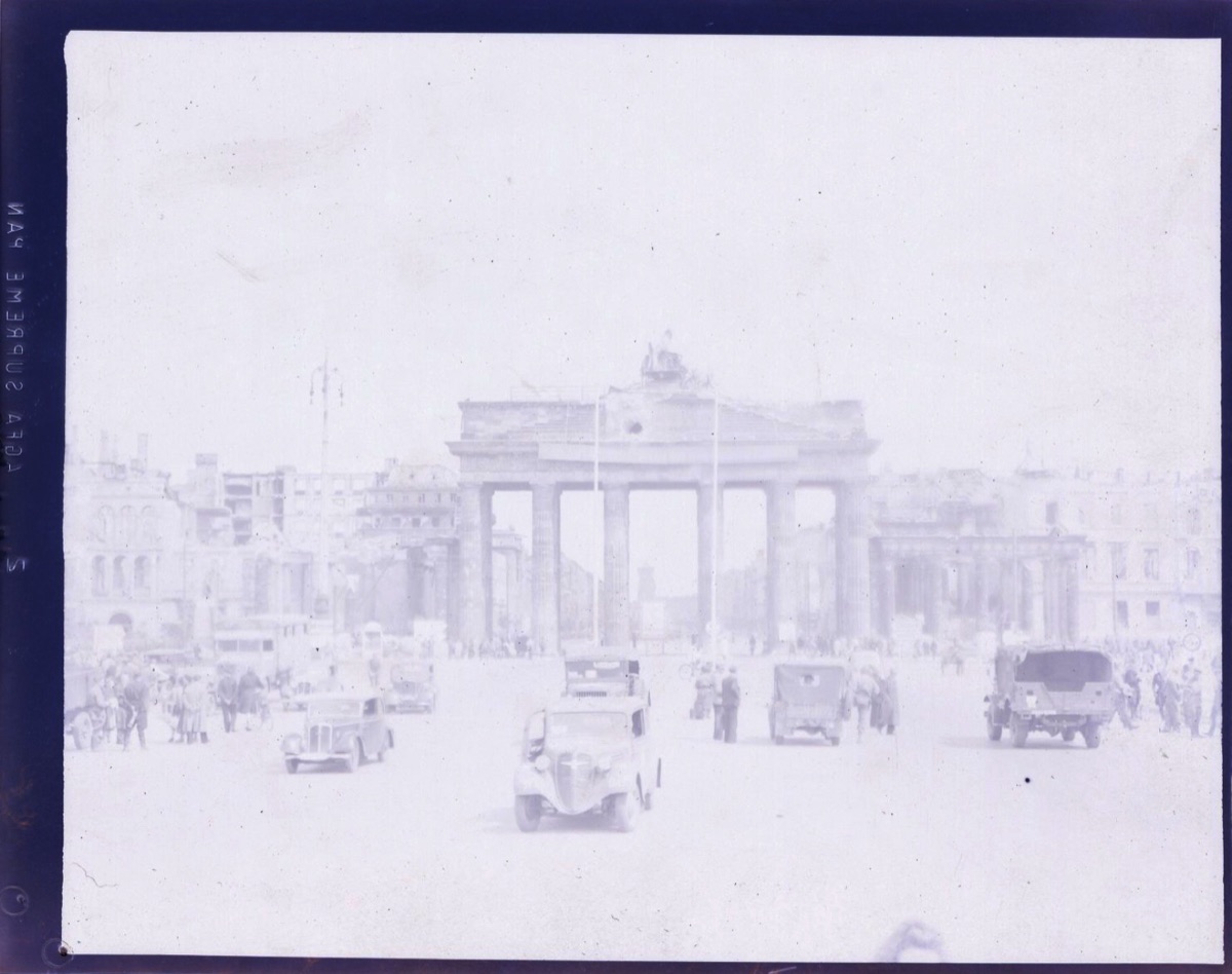 The Brandenburg Gate standing damaged among ruins in 1945